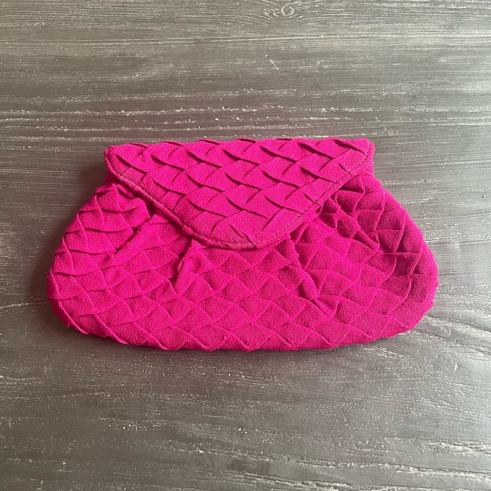 Fuchsia petal effect clutch from Lauren Merkin